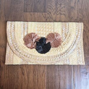 Elegant Woven Clutch with Floral Accents